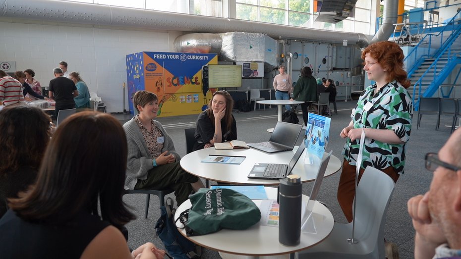 group of Accessibility Unlocked delegates at one of the demo tables