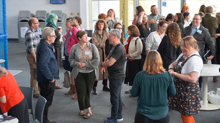 Accessibility Unlocked delegates talking at Winchester Science Centre