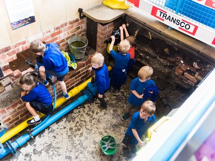 Eureka! Children's Museum school group exploring Transco pit
