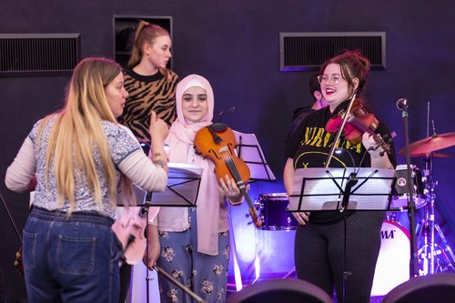 Young people from Tinderbox Sparks orchestra rehearsing