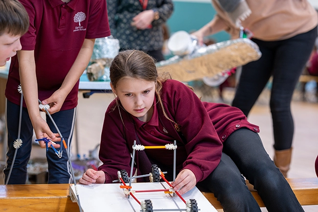 Winchester Science Centre valuing inclusion project girl constructing vehicle