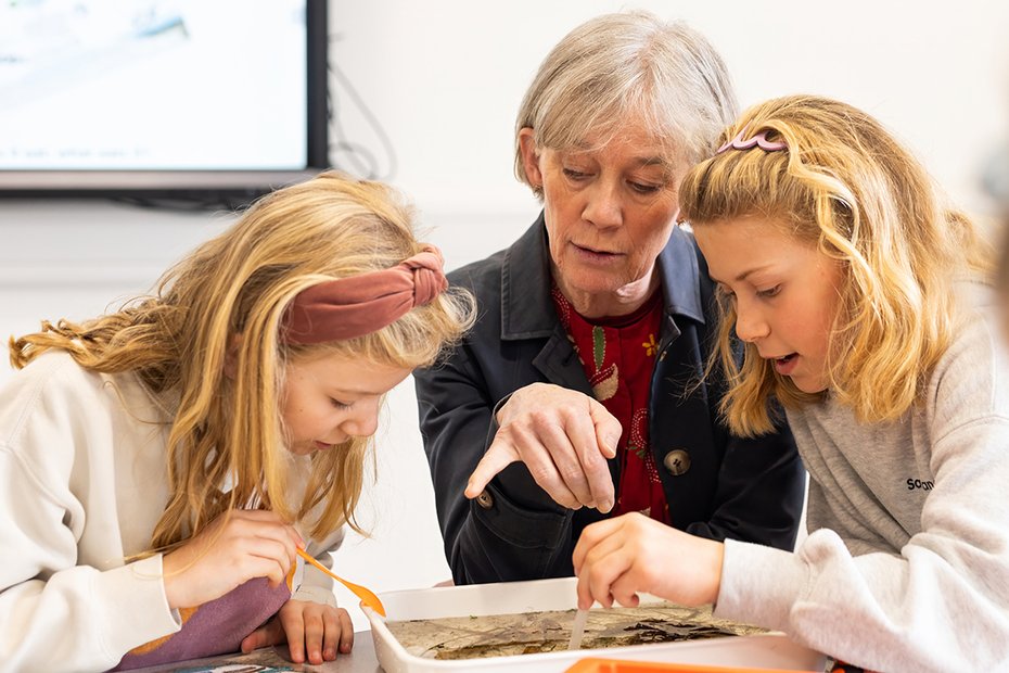 Professor Dame Angela McLean with pupils at Science Oxford Centre